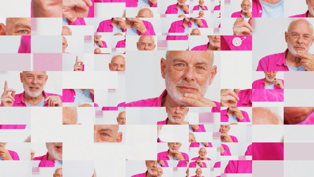 A still from Eno that shows many different frames of artist Brian Eno in a pink shirt.
